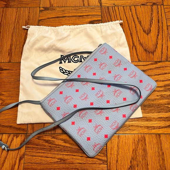 MCM Handbags - NWT! MCM Visetos Pouch Crossbody In Blue Bell